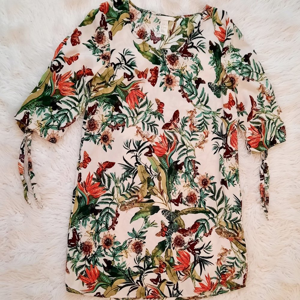Butterfly to the thigh floral blouse